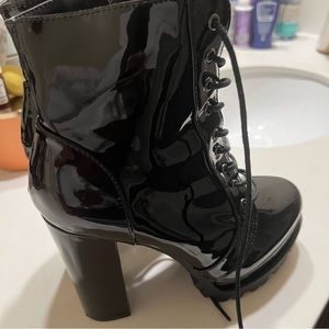 Never worn black patent leather shiny